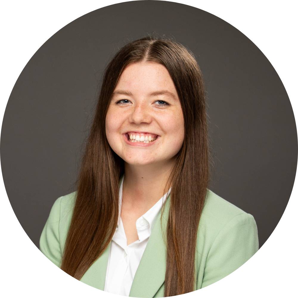 Sarra Watkins smiling for her professional headshot